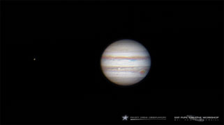 Jupiter, Io, and a Great Red Spot